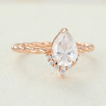 0.9 CT Pear Cluster & Twisted Shank Moissanite Engagement Ring